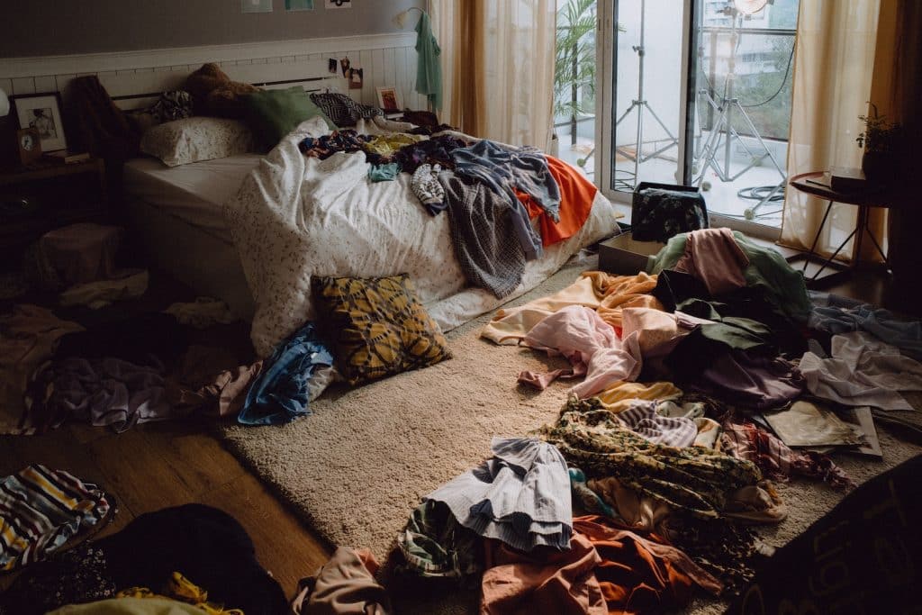 bedroom full of clutter